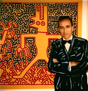 Lucio_Amelio, ©polaroid di Augusto De Luca con lo sfondo di un'opera di keith haring